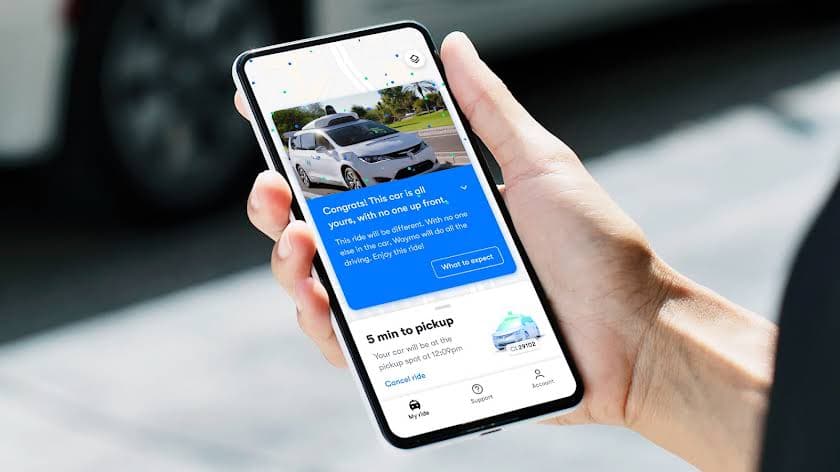 The Waymo One ride-hailing app showing an arriving autonomous vehicle