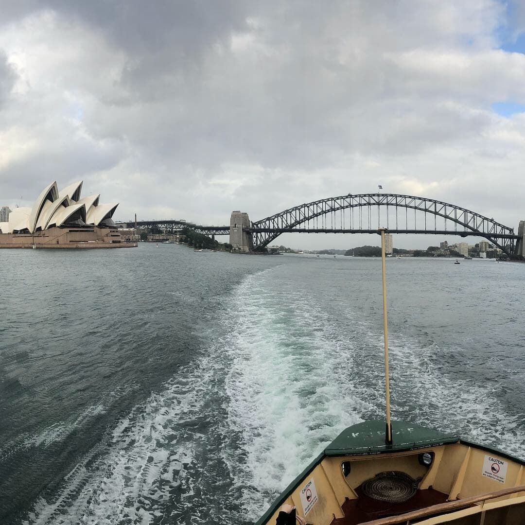 A ferry wake between the Sydney Opera House and Harbour Bridge.